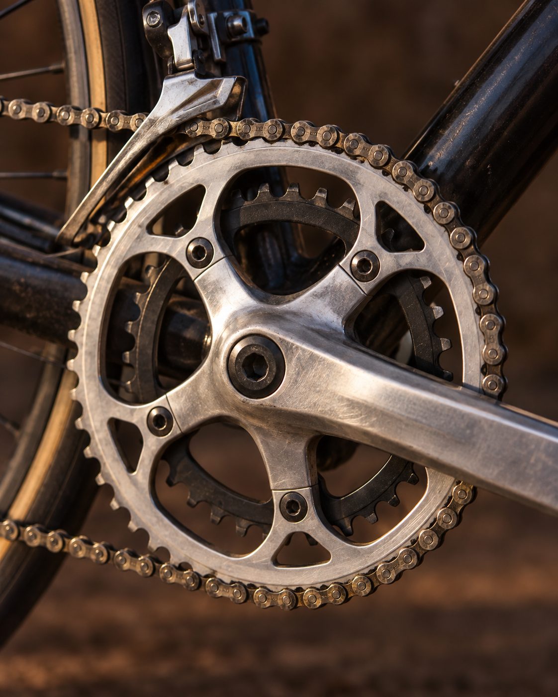 Road bike crankset with the chain on the large chainring